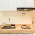 Comfortable 2Br With Study Room At Meikarta Apartment By Travelio