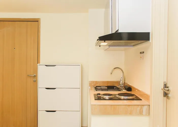Comfortable 2Br With Study Room At Meikarta Apartment By Travelio